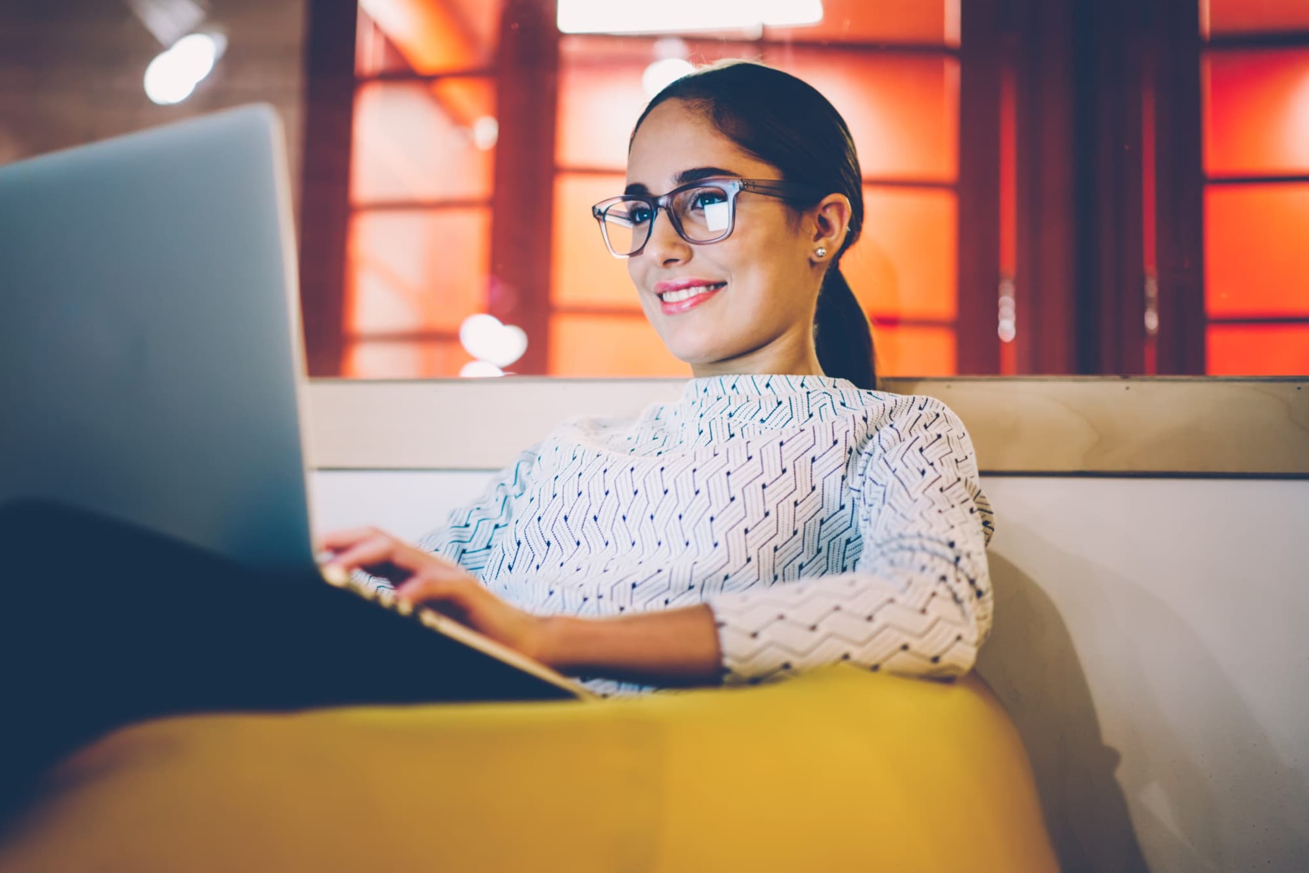 woman sitting with laptop